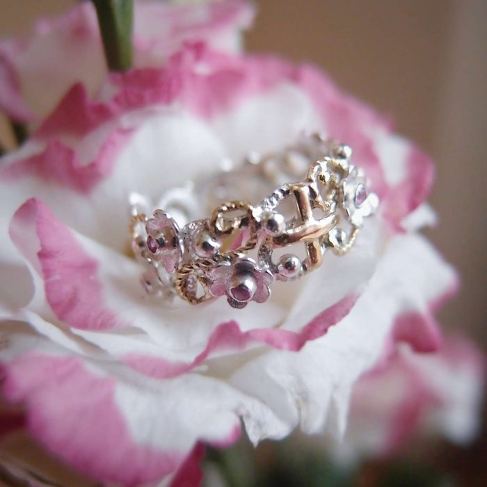Floral rosary ring with tiny flowers
