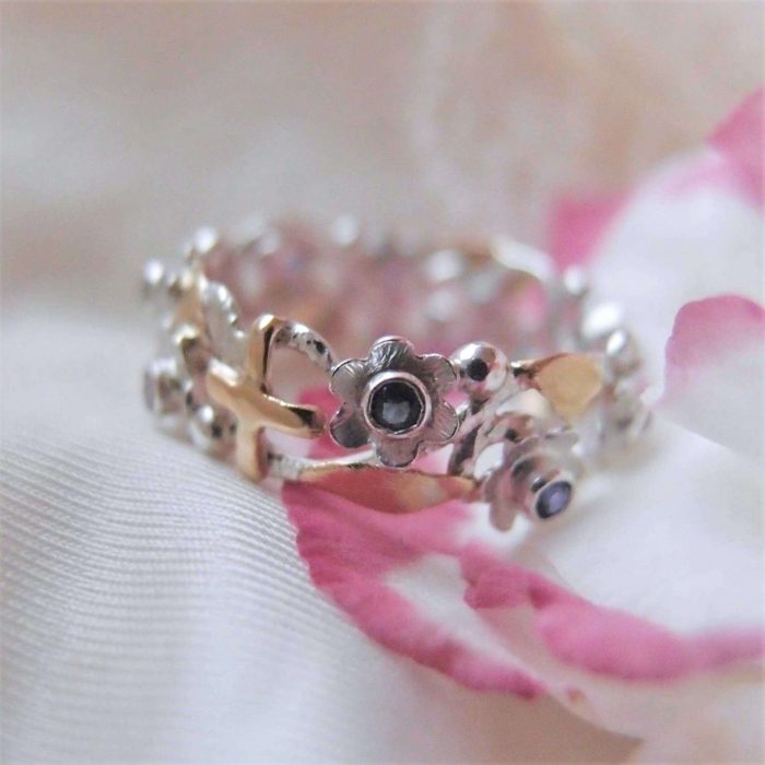 Botanical rosary ring with flowers with