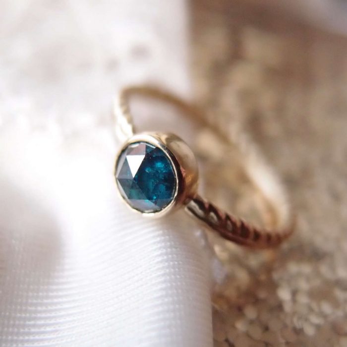 Blue diamond engagement ring