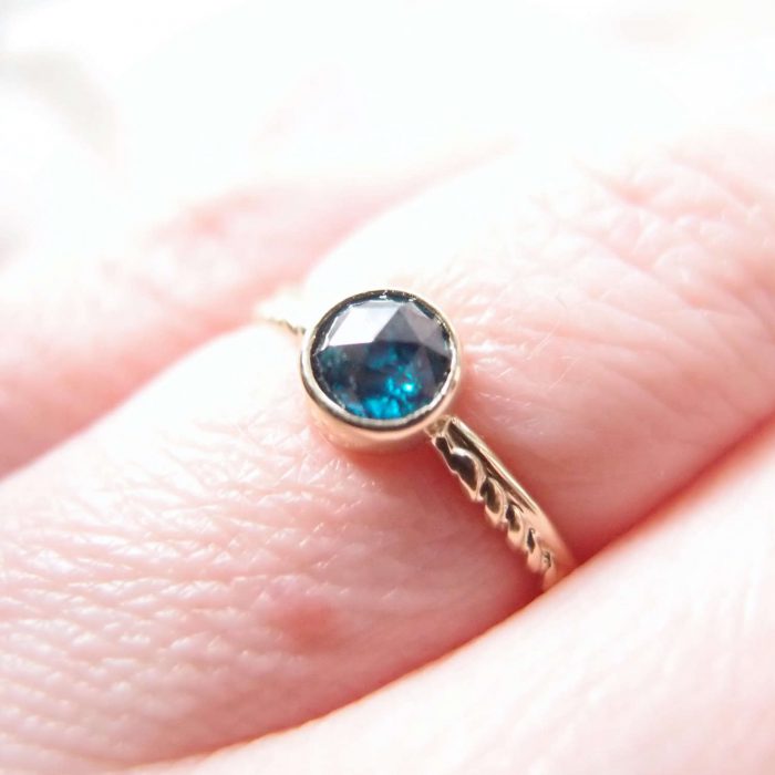 boho engagement ring with blue diamond